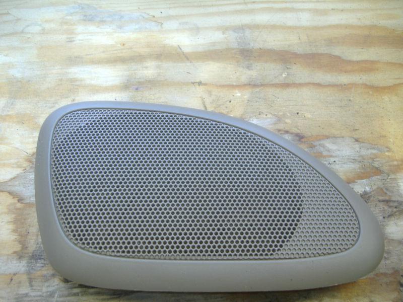 Left side rear driver convertible speaker grill cover  2001 chrysler sebring 