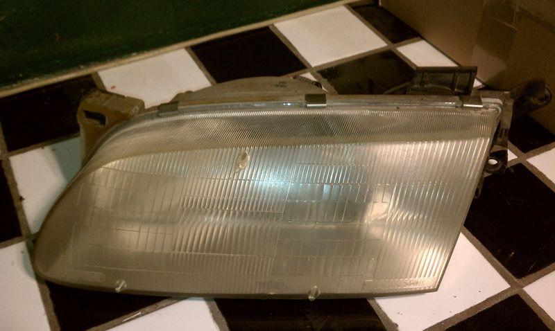93 94 95 96 97 mazda mx-6 l. headlight 0014099l:
