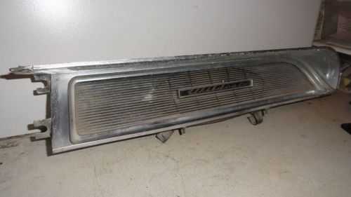 1962 buick wildcat dash radio speaker w/wildcat emblem.light pimpling broken tab