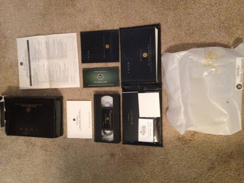 Cadiilac owners package complete /in the wrapper /oem cadillac