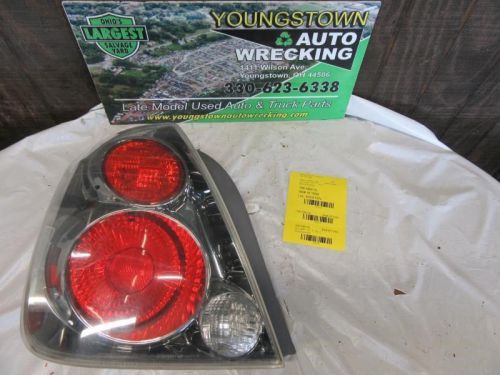 Driver left tail light quarter panel mounted exc. se-r fits 05-06 altima 1521790