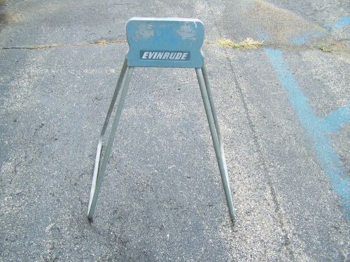 Evinrude outboard motor stand antique used for repairs or showroom displays