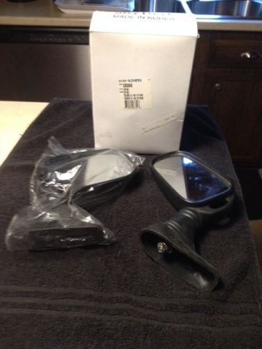 Rearview snowmobile mirrors