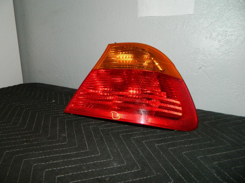 Oem 1999-2001 bmw 3 series right /  passenger side tail light assembly 