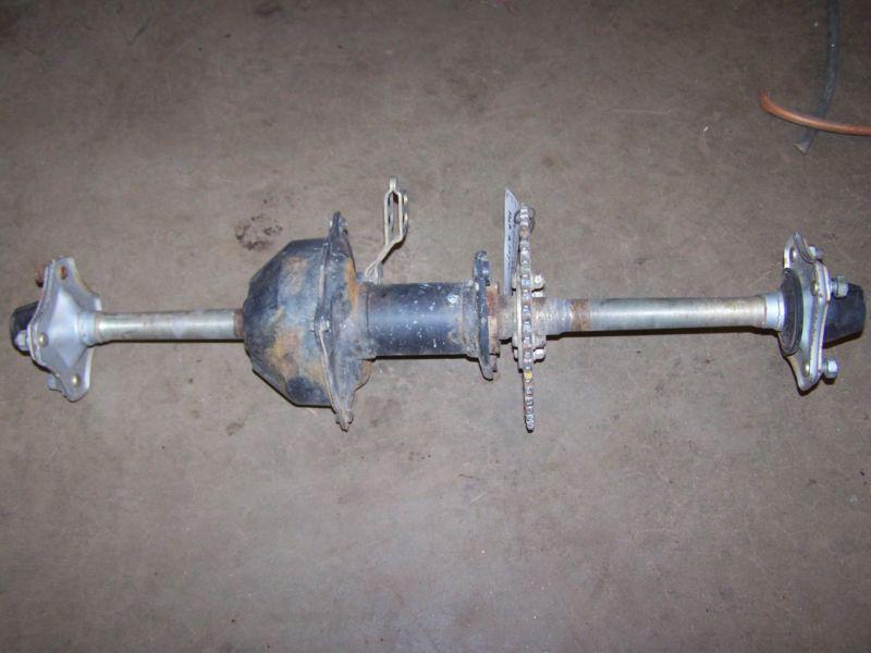 1987 kawasaki mojave klf110b 4-wheeler rear axle assym with hubs