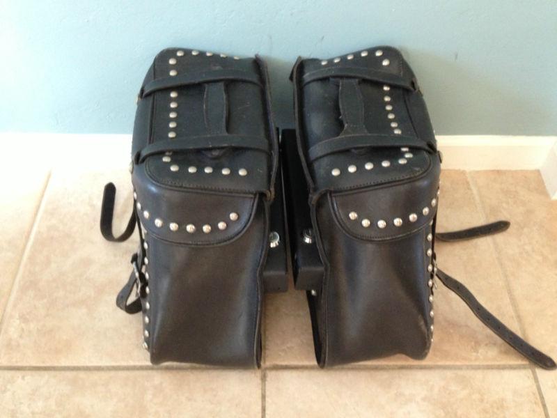 Leatherworks 112 studded saddle bags mounted to easy brackets for harley dyna 