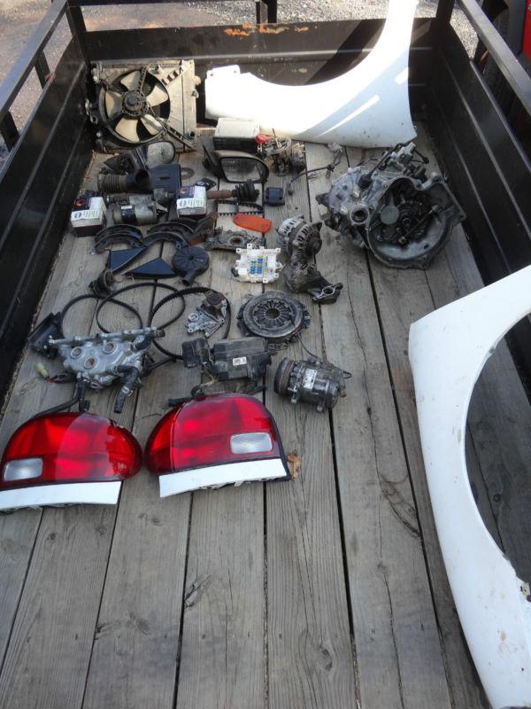96 geo metro manuel transmission 1.3 4 cyl, tail light, lots of parts