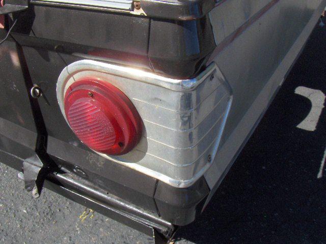 Apache pop up tent trailer tail light lens and lens mount.