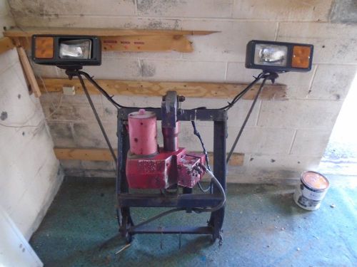 Western plow  pump, soleniod control and light frame for a unimount