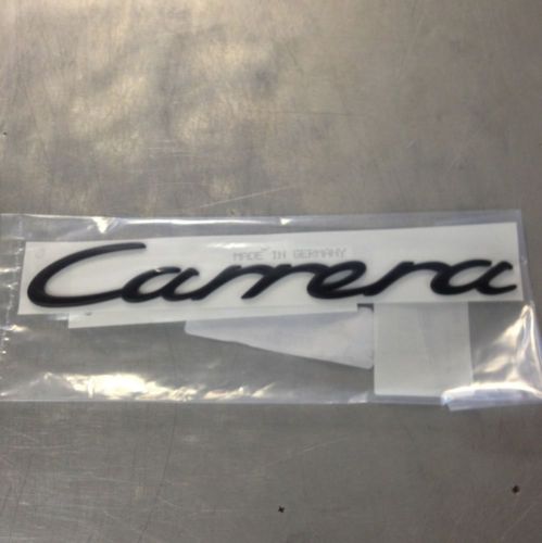 Porsche carrera gts emblem. black genuine porsche part.