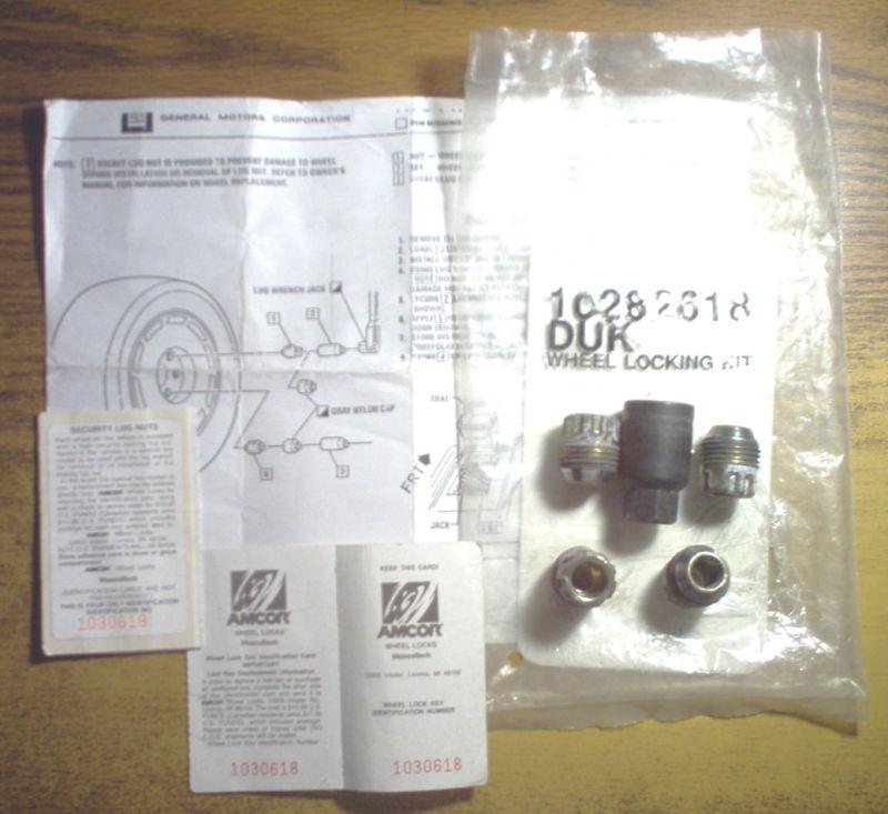 1984-1996 chevrolet corvette locking wheel lug set & key oem original gm w/paper