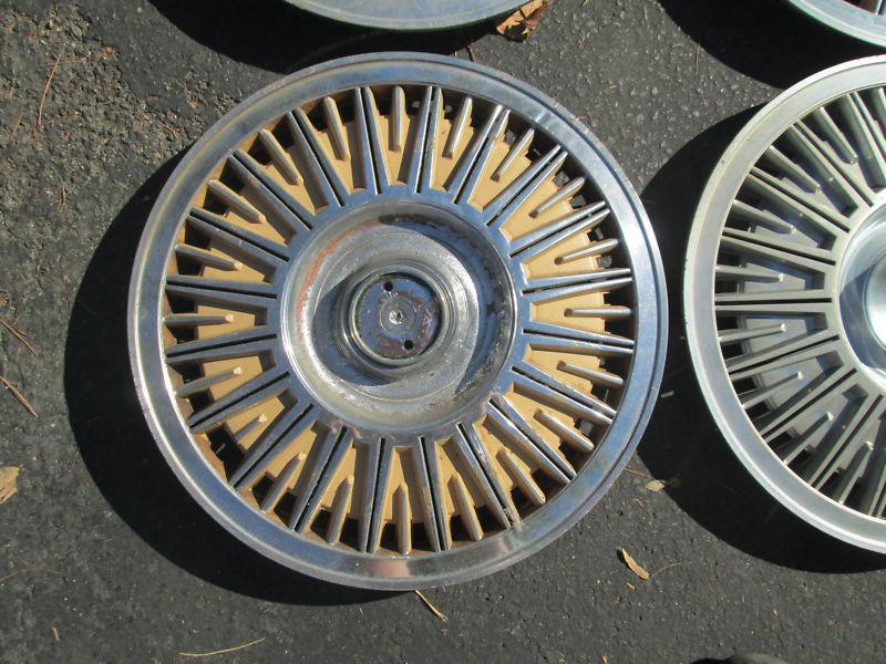 Purchase DODGE 400 600 LEBARON ARIES HUBCAPS in Oradell, New Jersey, US
