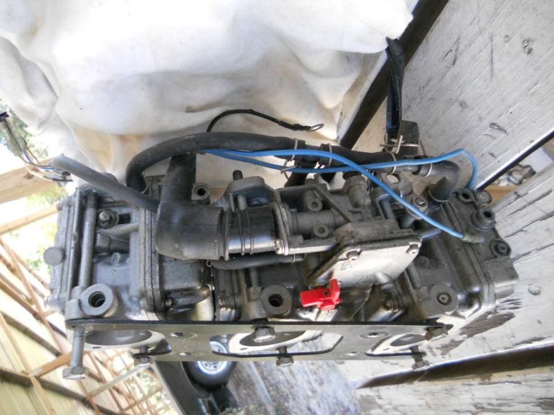 1998 yamaha 40 hp. triple carb set