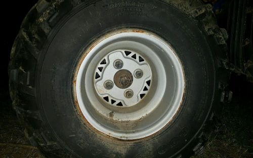 Polaris rear wheel set rim tires parting out quads set of 2