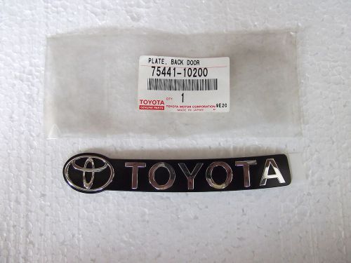 Toyota starlet ep 80 back door name plate emblem (genuine) (nos)a