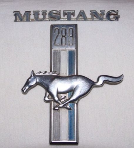 Vintage 1960s original pair of mustang fender emblems "mustang" and 289 horse