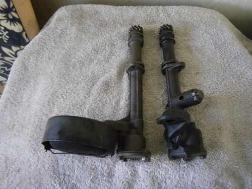 2 ford flathead v8 oil pumps and one canister with the screen,1932-1951
