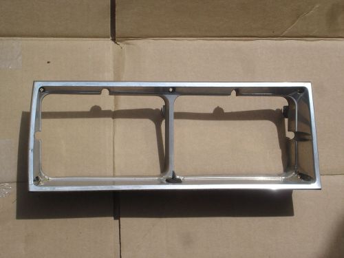 81 oldsmobile cutlass supreme head light door (may fit others)