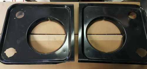 Land rover defender headlight surround frame pair