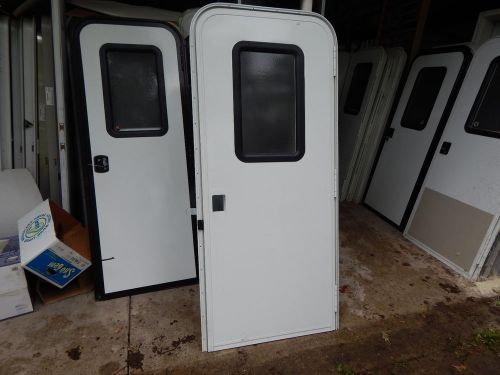 Trailer door, 30" x 70".  with screen door, frame, locks &amp; keys, new door #38