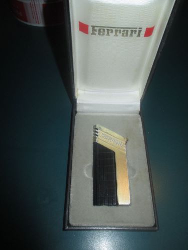 Ferrari black &amp; gold cigarette lighter made by cartier for ferrari formula 308