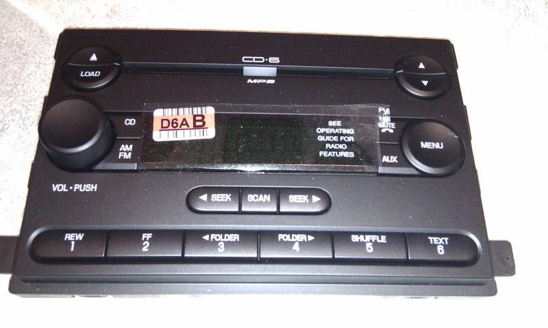 New cd6 mp3 face plate for ford radios like mustang, taurus, f-150, oem original