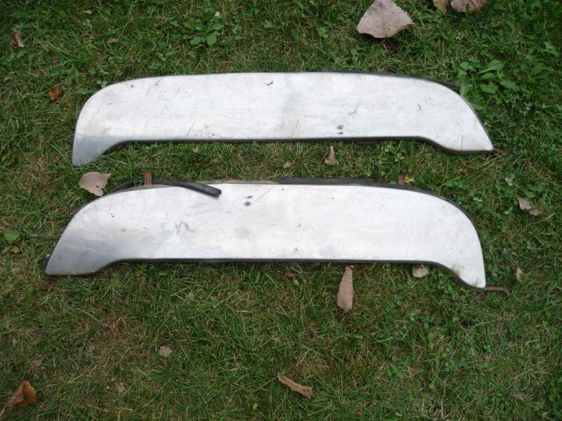 A pair of vintage chrome fender skirts.  ford?  gm?  1950's?  1960's?  