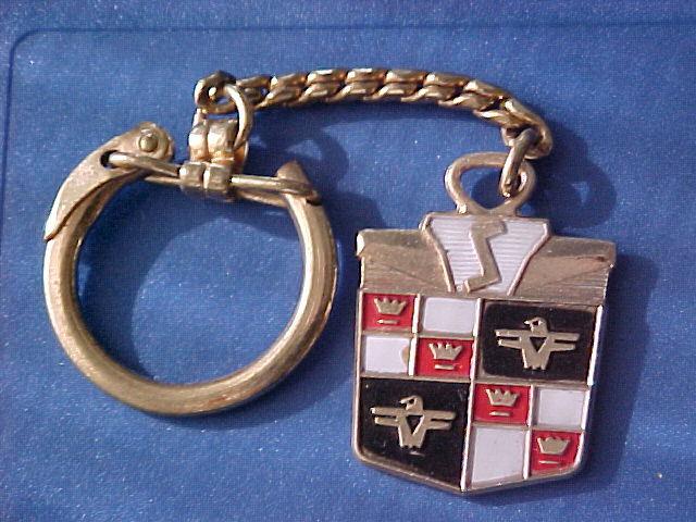 Vintage studebaker gold key chain