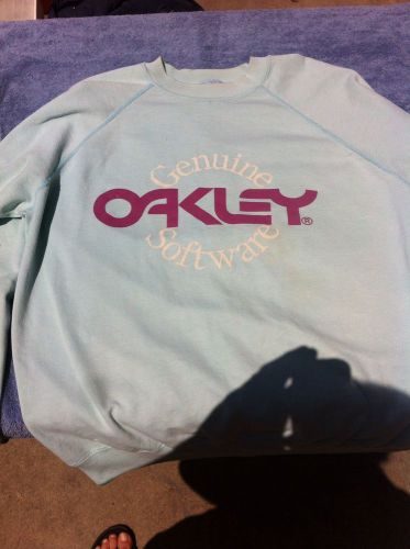 Vintage oakley genuine software sweatshirt. teal lg. rare.