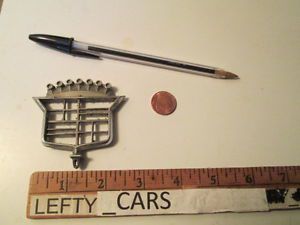 1 vintage cadillac hood ornament (dioramas!)- used