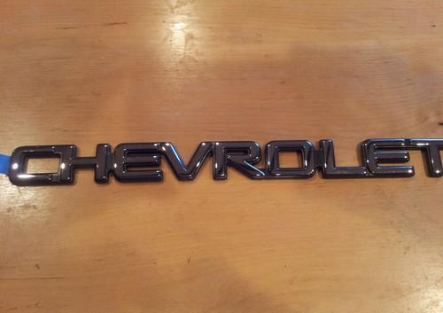 Chrome chevrolet nameplate emblem