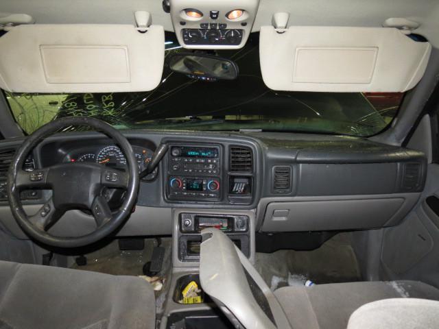 2005 chevy tahoe speedomter and radio trim dash bezel 2542374