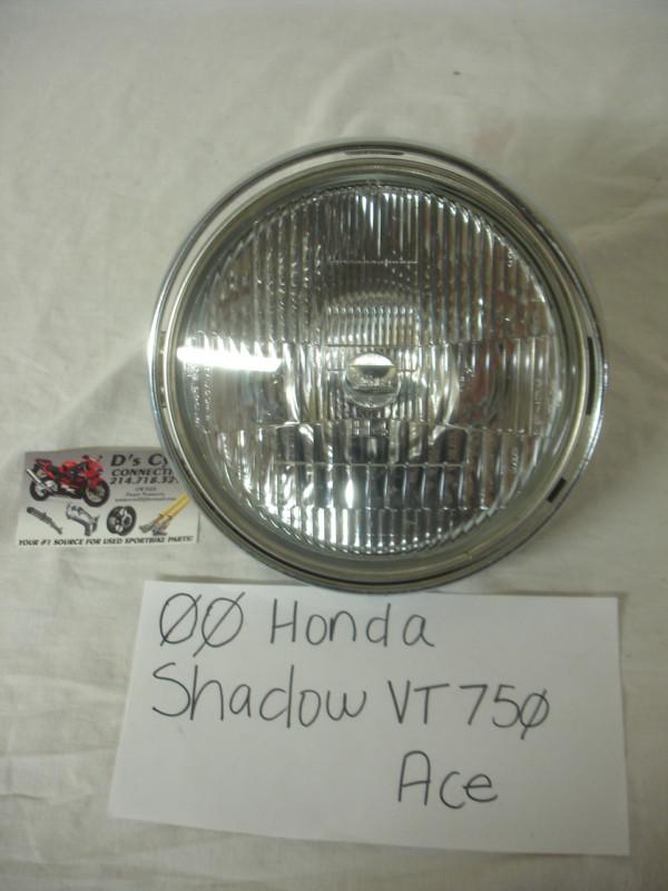 00 honda shadow vt-750 ace headlight complete with headlight ring. good used oem