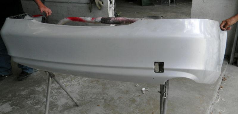 Mercedez benz - 2007 - cls550 rear bumper cover -w/o sensors oem reconditioned.