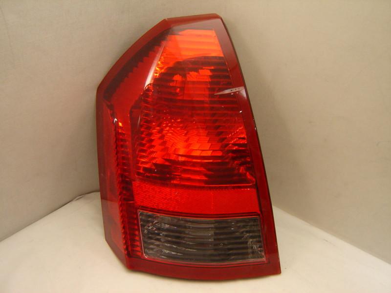Sell CHRYSLER 300 Left Tail Light 05 06 07 OEM in Laval, Quebec, CA