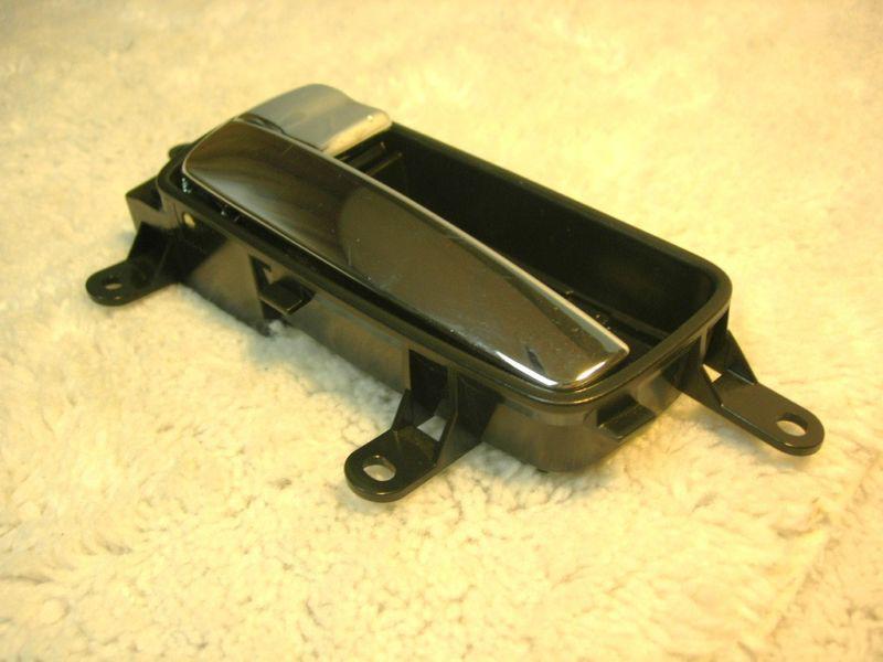 Sell NISSAN SENTRA INTERIOR DOOR HANDLE,LEFT BLACK,&BACKDOOR in Miami