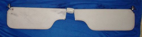 1977 cadillac seville white sun visors both plus the clip in good condition oem.