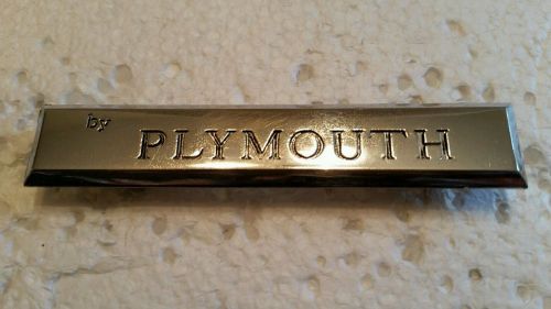 1963 1964 plymouth valiant rear tail panel or decklid &#039;by plymouth&#039; emblem nice