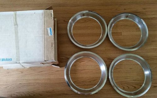 Set of 4 nos gm# 9796696 trim rings for a 1967 corvette