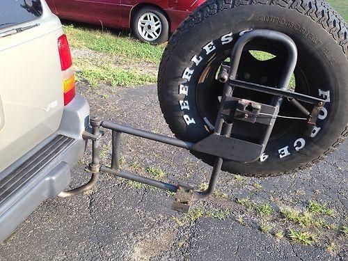 Rare grand cherokee tire carrier