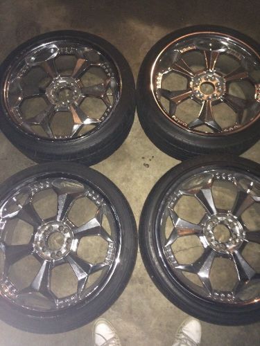 Four 20" rims with tires, 5 slug tire