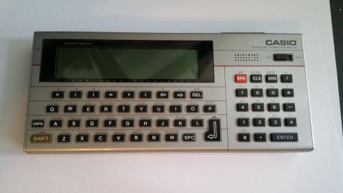 Vintage casio pb 700 personal computer. made in japan w/ 2  memory packs or-4