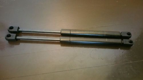 Set of 2 trunk tailgate lift supports shock struts cadillac
