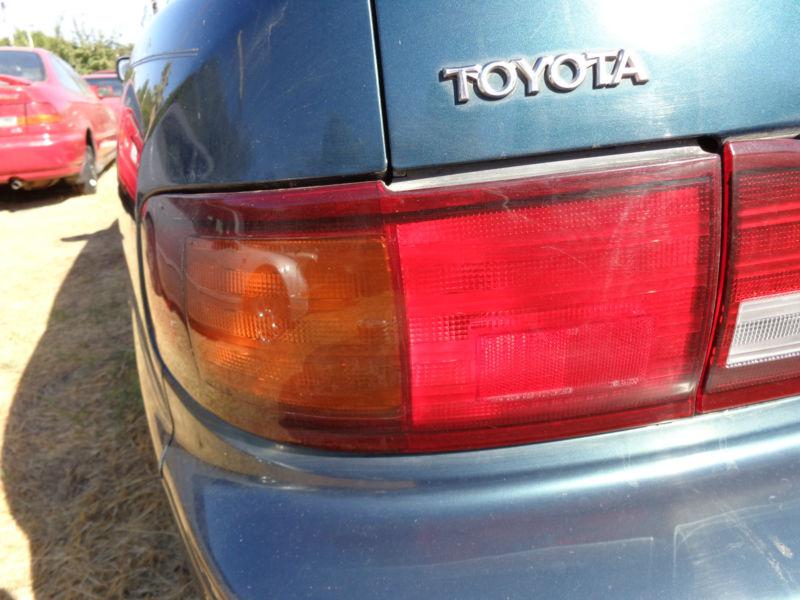 Driver rear tail light lens 95 96 toyota camry turquoise 4 dr sedan 2.2 oem