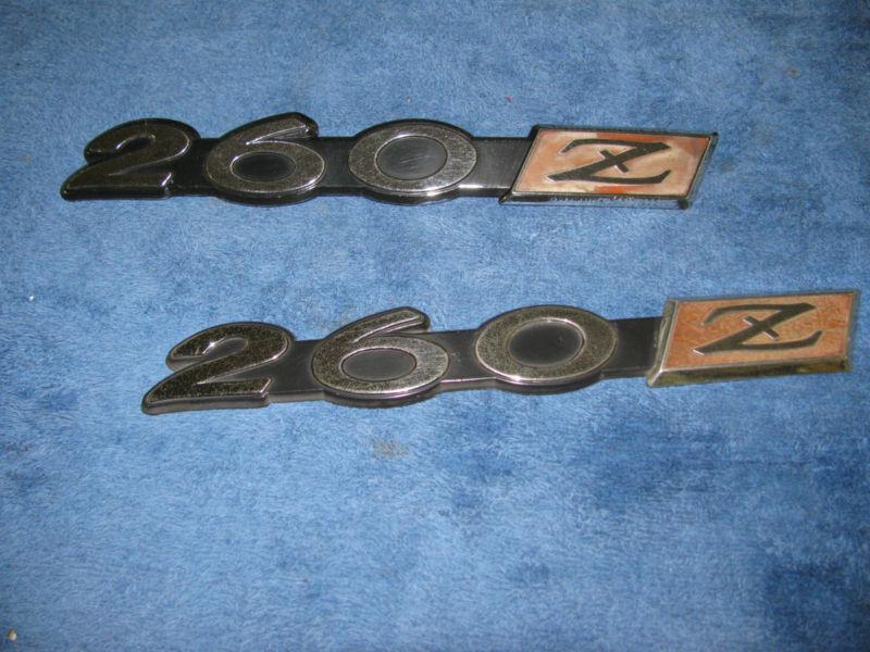 Datsun 260z used fender emblem needs some tlc 