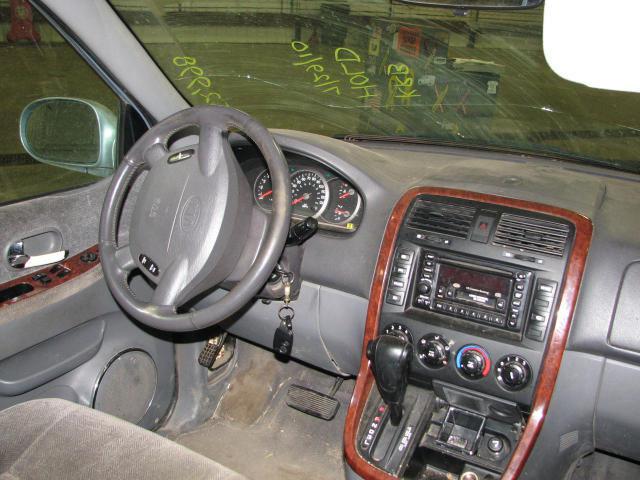 2002 kia sedona front driver seat belt & retractor only gray