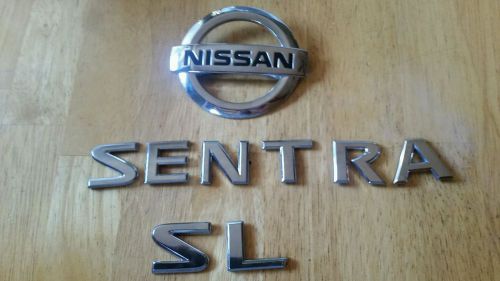 07-12 nissan sentra slrear chrome oem emblem set stk#n49