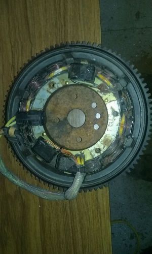 Omc part # 584843 flywheel 95 to 06 90-100-105 and 115hp's used and stator