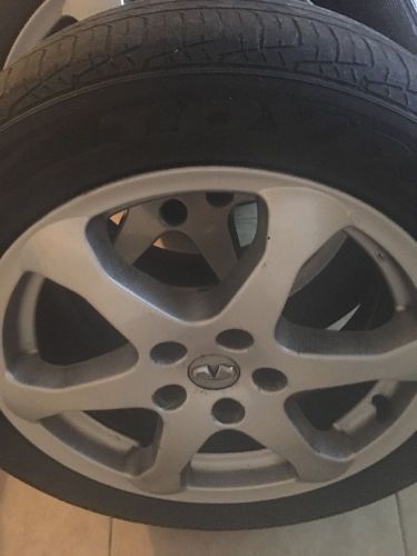 2003-2007 infiniti g35 factory  17" rims "4"