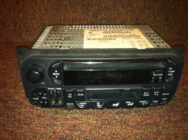 Used 2002 chrysler town & country cd ,cassette and fm/am radio(parts/repair only